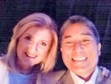 Guy and Arianna Huffington take a selfie at BlogHer