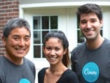 That's Melanie Perkins and Cliff Obrecht with Guy on the day he signed with Canva